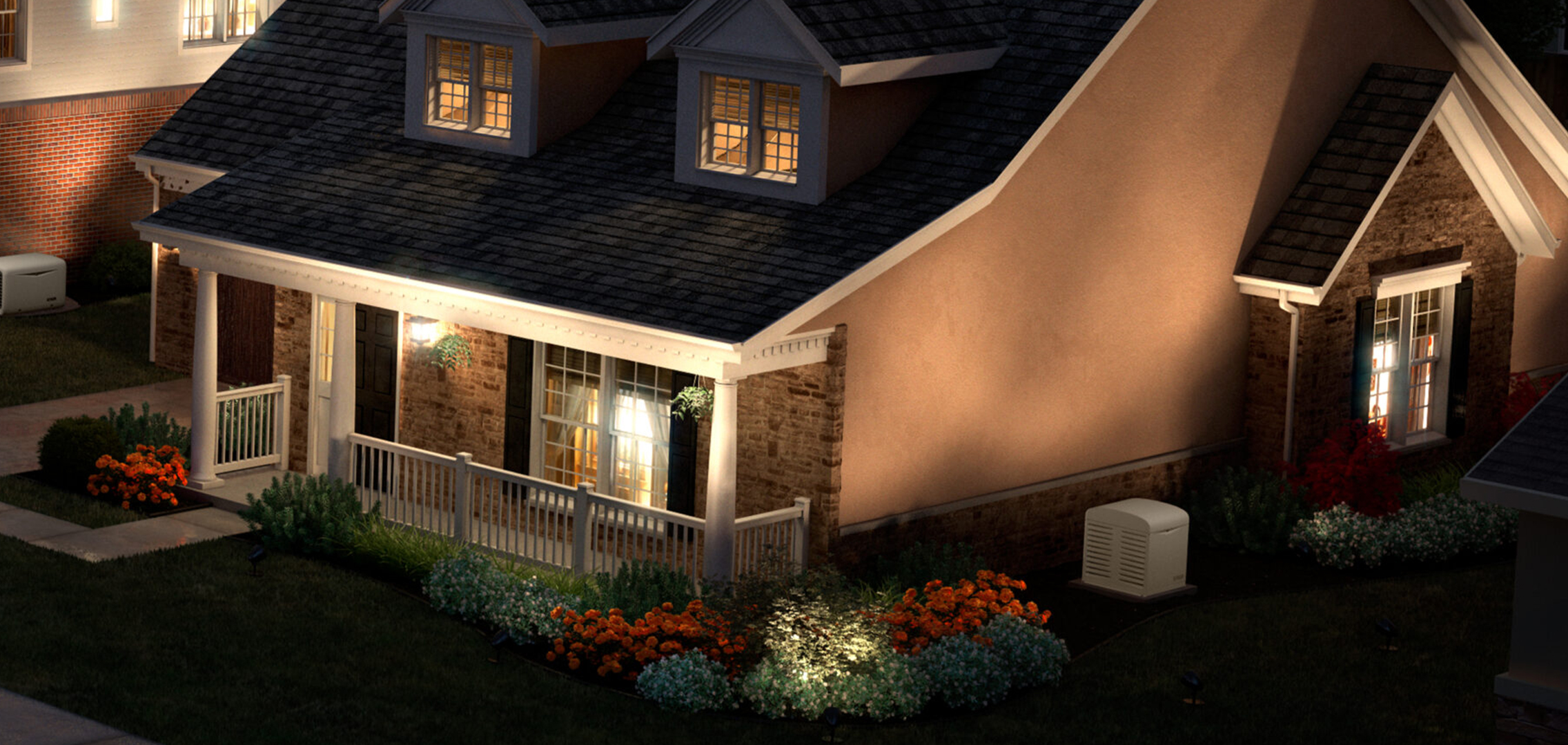 Residential home with a generator at nighttime.