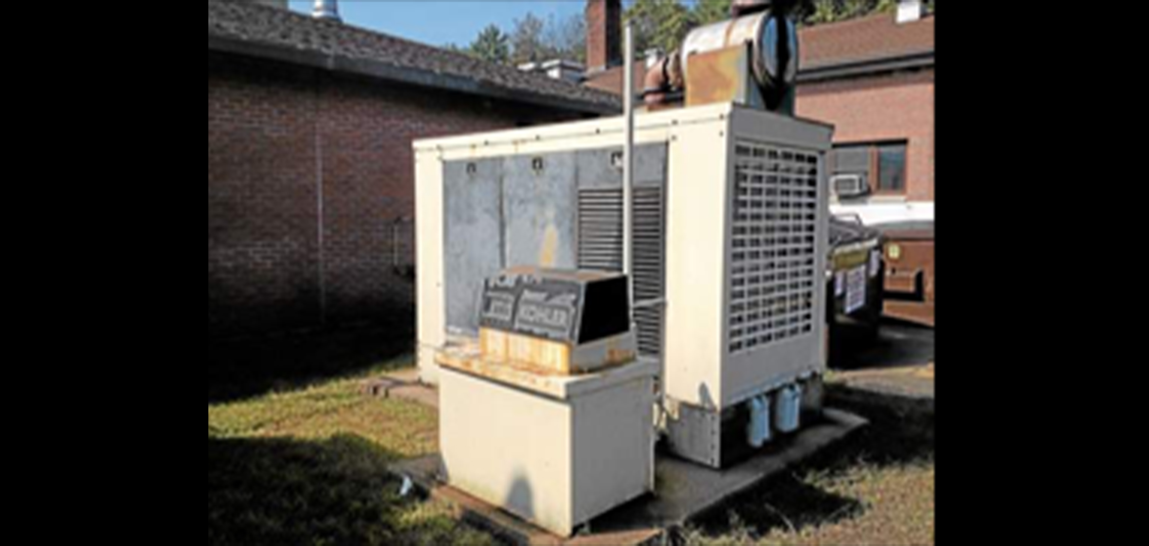 Generator outside a building.