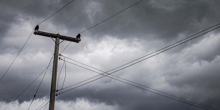 Power line with a stormy background