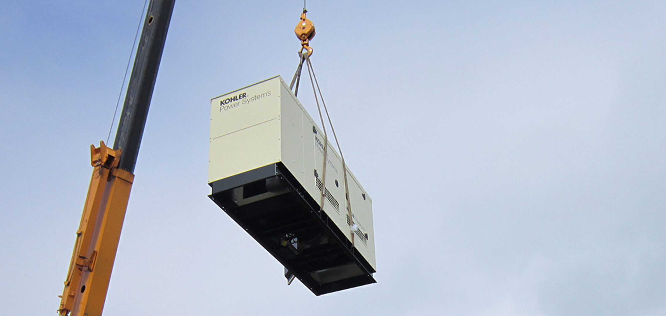 Commercial generator being airlifted