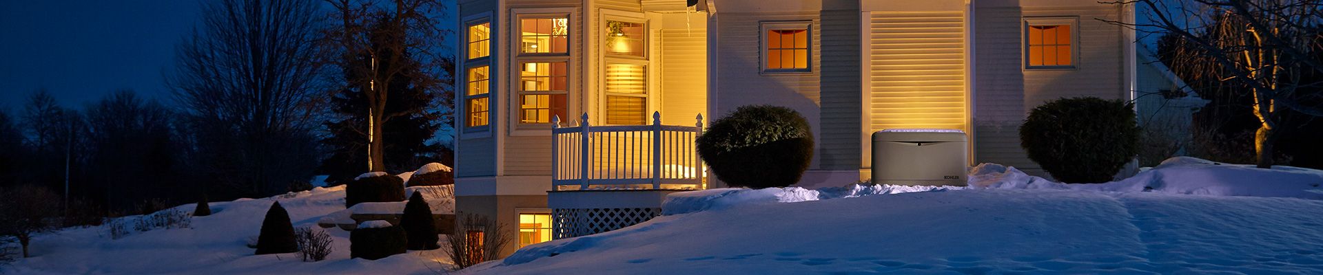 Generator outside of house in snow
