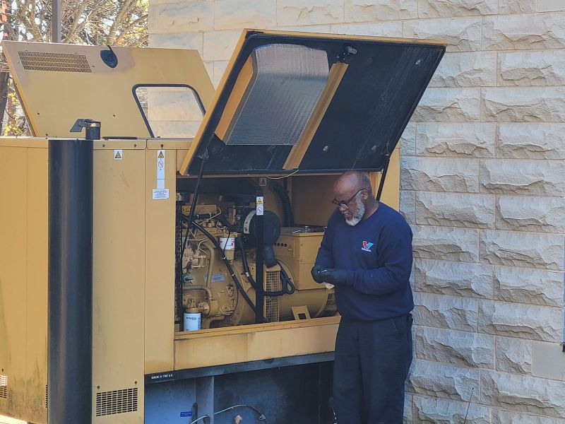 Tower Generator employee working on generator