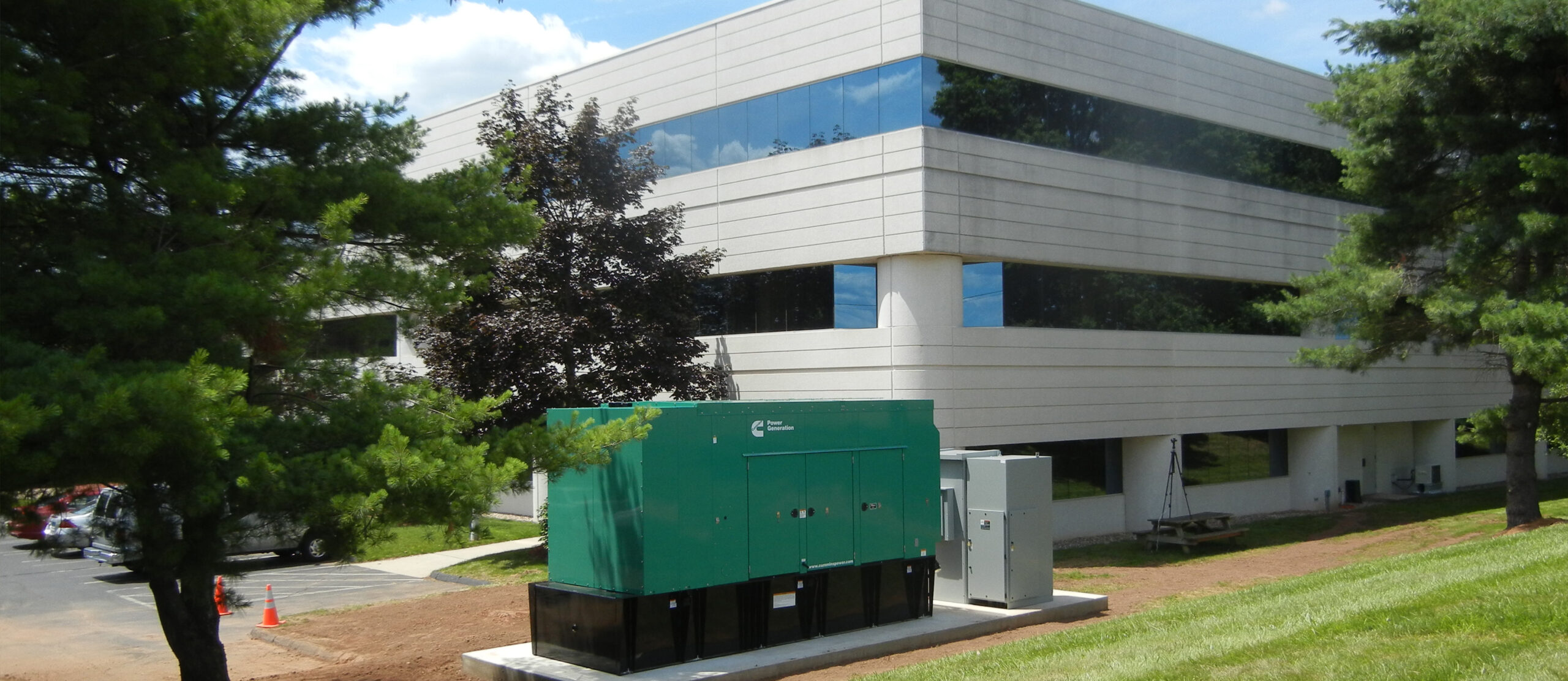 A commercial backup generator outside of a business.